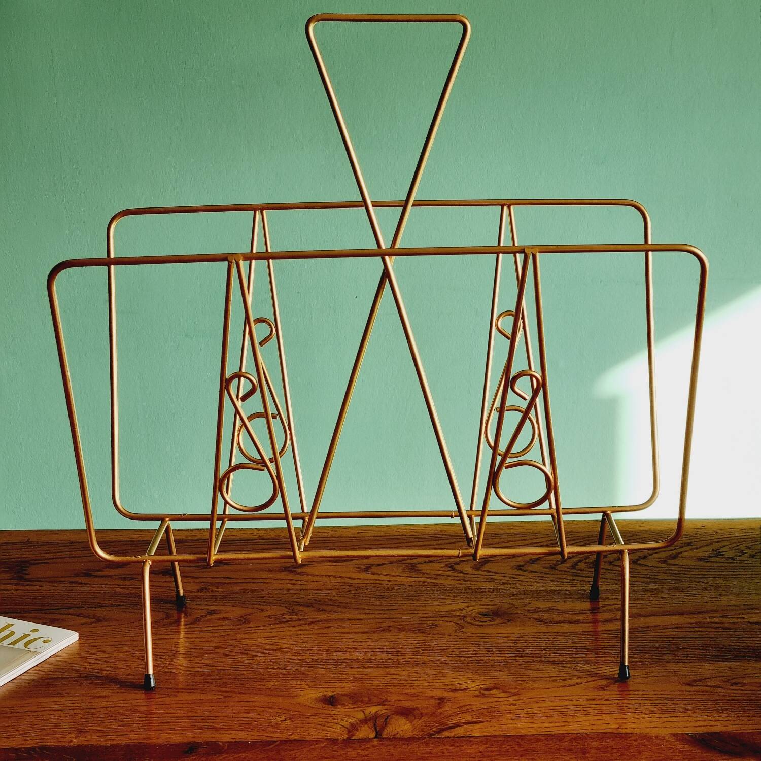 Golden metal magazine holder