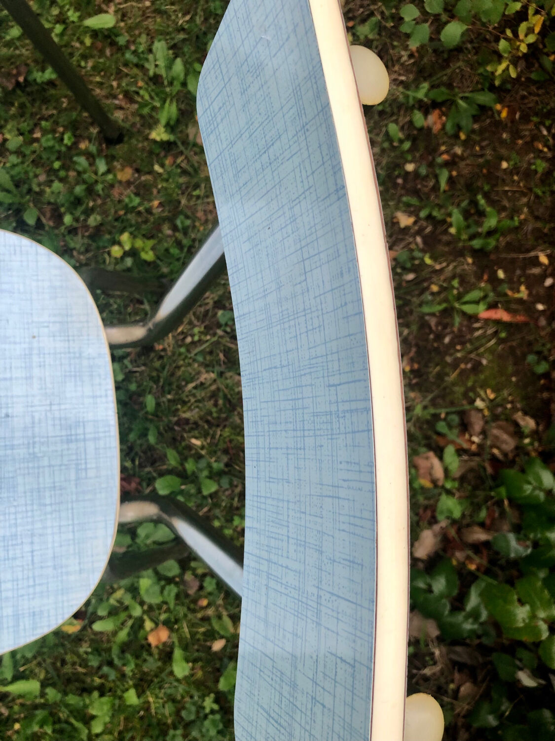 2 blue formica chairs