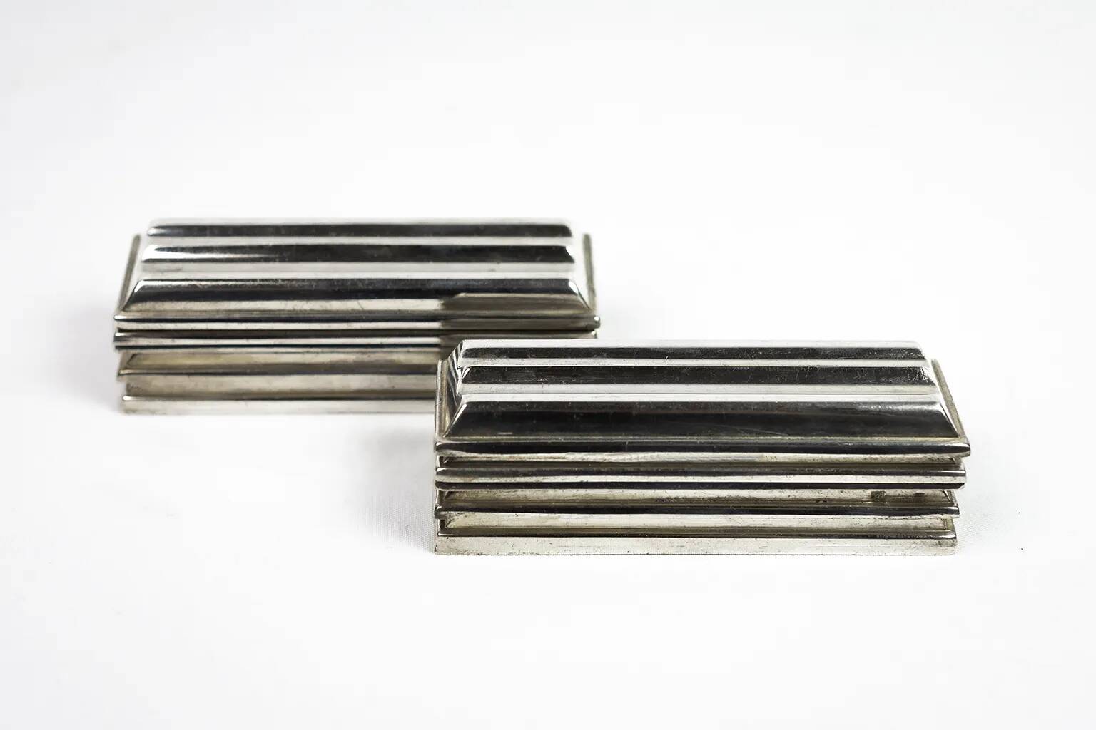 Christofle — 12 “Ondulations” knife rests by Luc Lanel, silver-plated metal