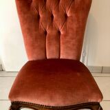 Petit fauteuil capitonné