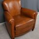 Paire de fauteuils club en cuir