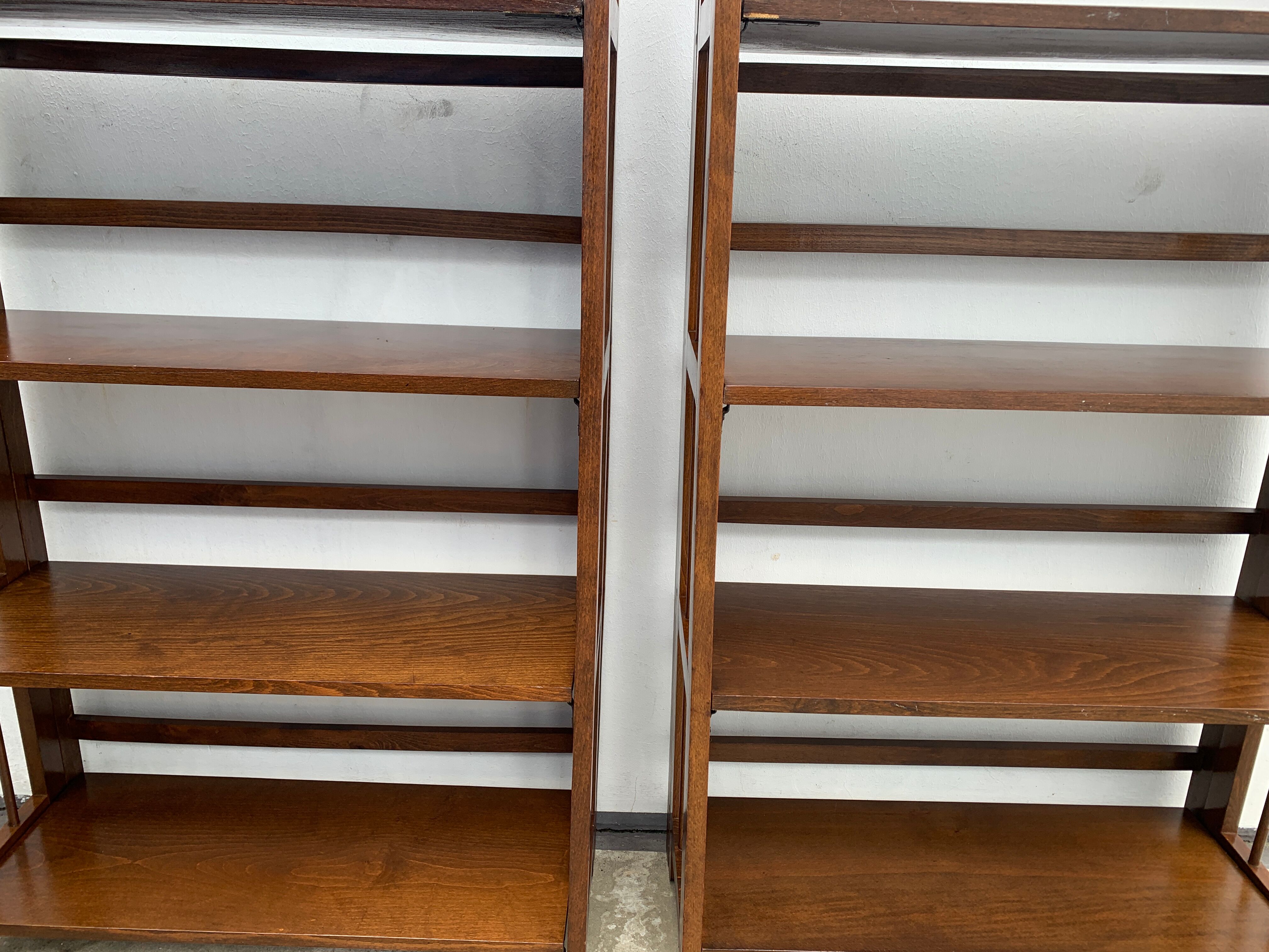Pair of folding wooden bookcases, 4 shelves, 1950