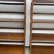 Pair of folding wooden bookcases, 4 shelves, 1950