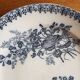 Assiette en faïence à décor de fleurs