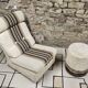 Boucle wool fireside chair and its 1970" vintage pouf