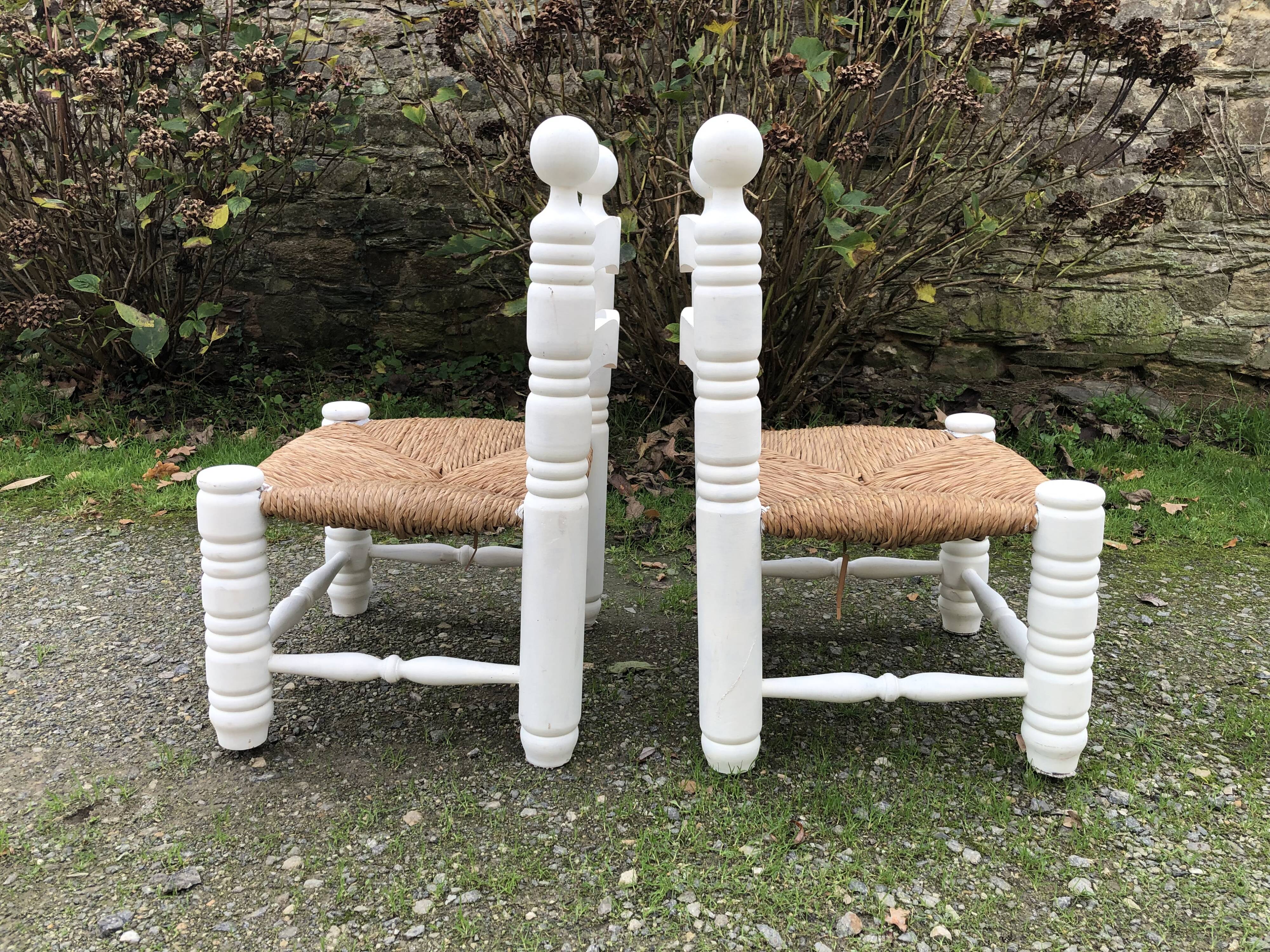 Duo de chaises vintage paillées par Charles Dudouyt.