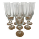 Set of 8 crystal champagne flutes in classic design.