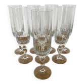 Set of 8 crystal champagne flutes in classic design.