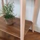 Side table with curved pink legs