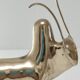 Two stylized zebu with long vintage brass horns