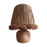 Lampe en pierre et raphia