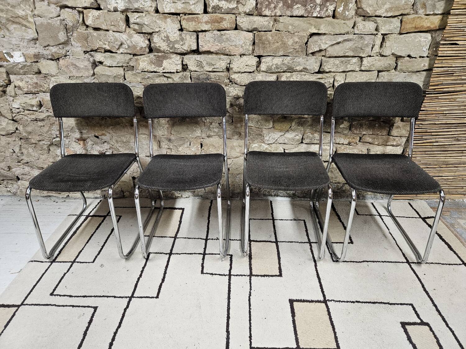 Set of four vintage 1970 sled chairs