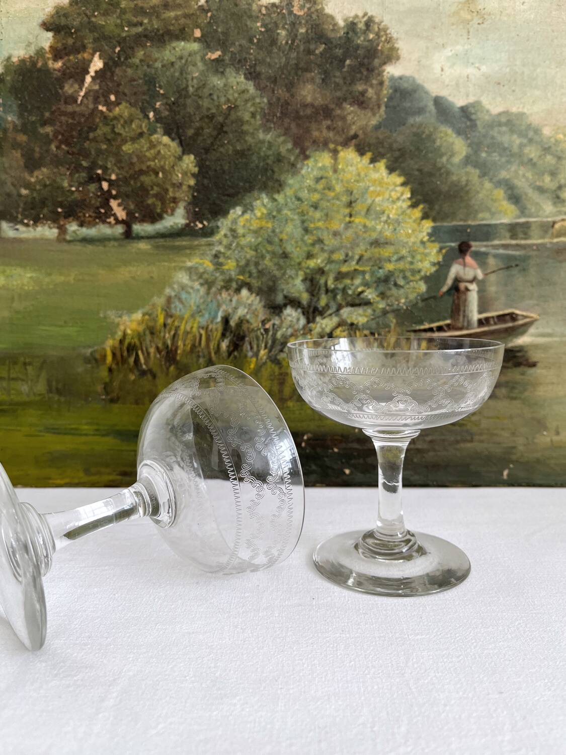 2 antique champagne glasses in engraved glass