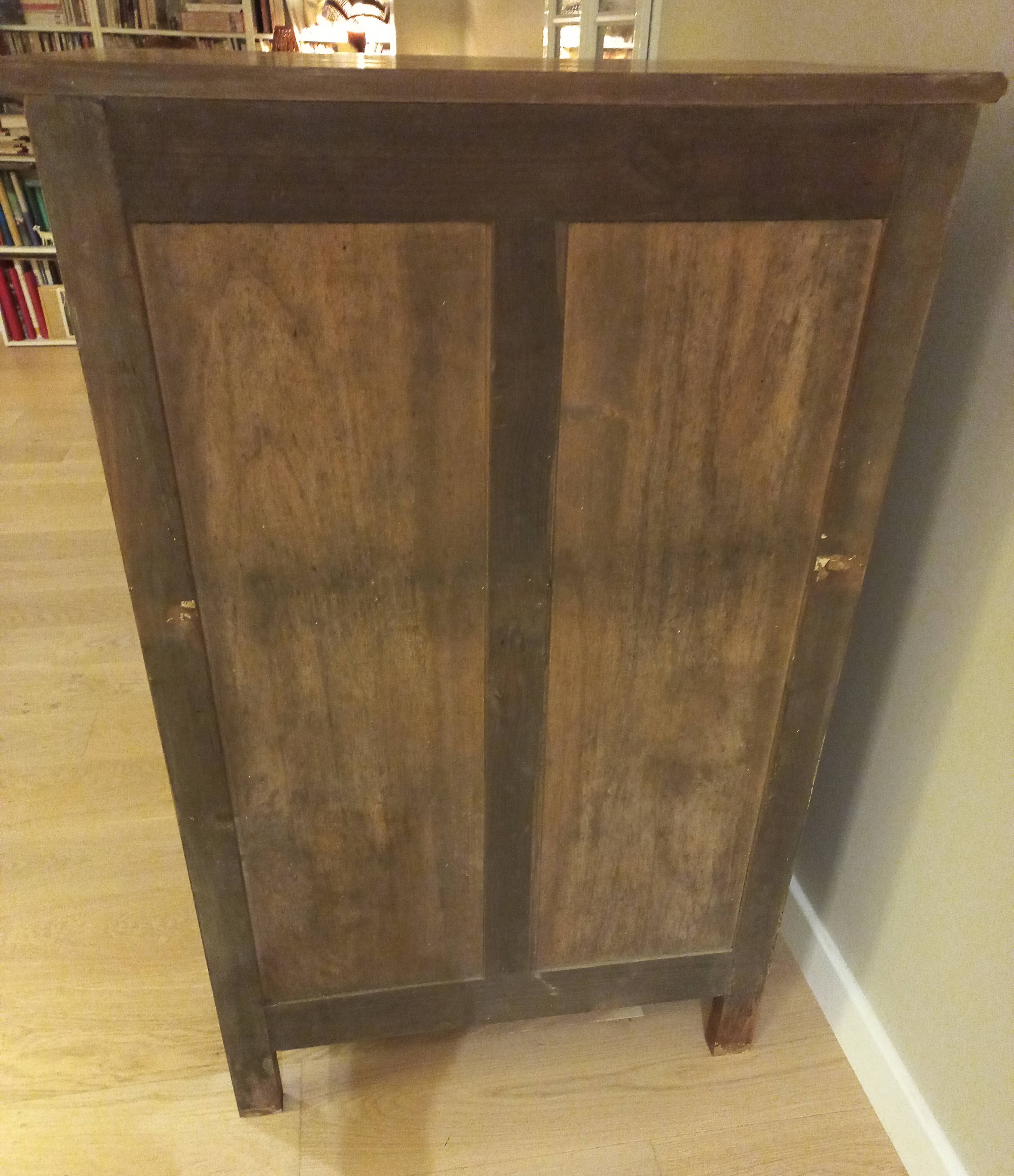 Small table and cherry wood sideboard.