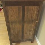 Small table and cherry wood sideboard.