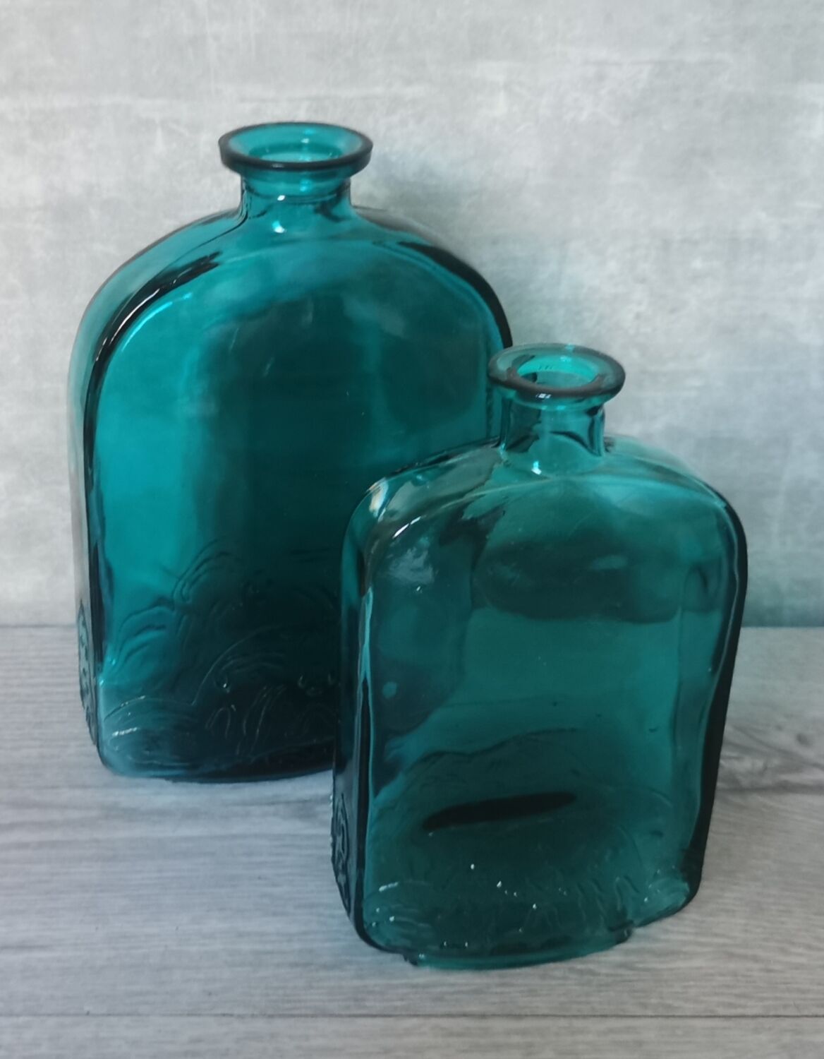 Blue engraved glass bottles