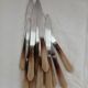 12 couteaux anciens en bakélite + inox