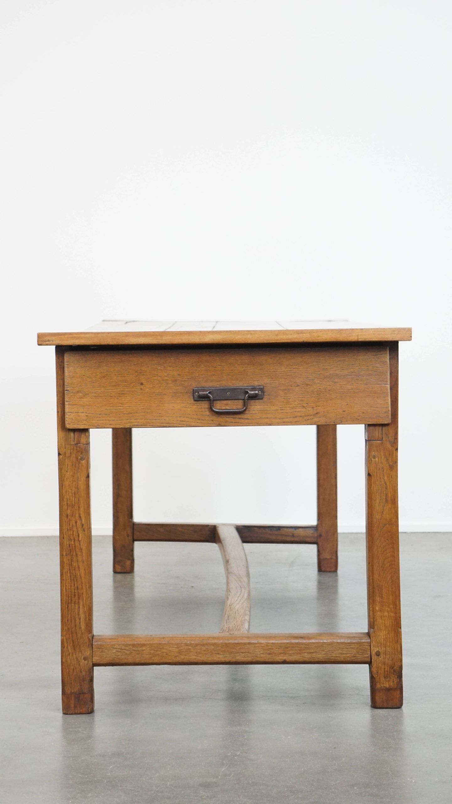 Antique French farmhouse dining table of fruitwood from the 18th century