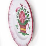 Plate and its wall attachment