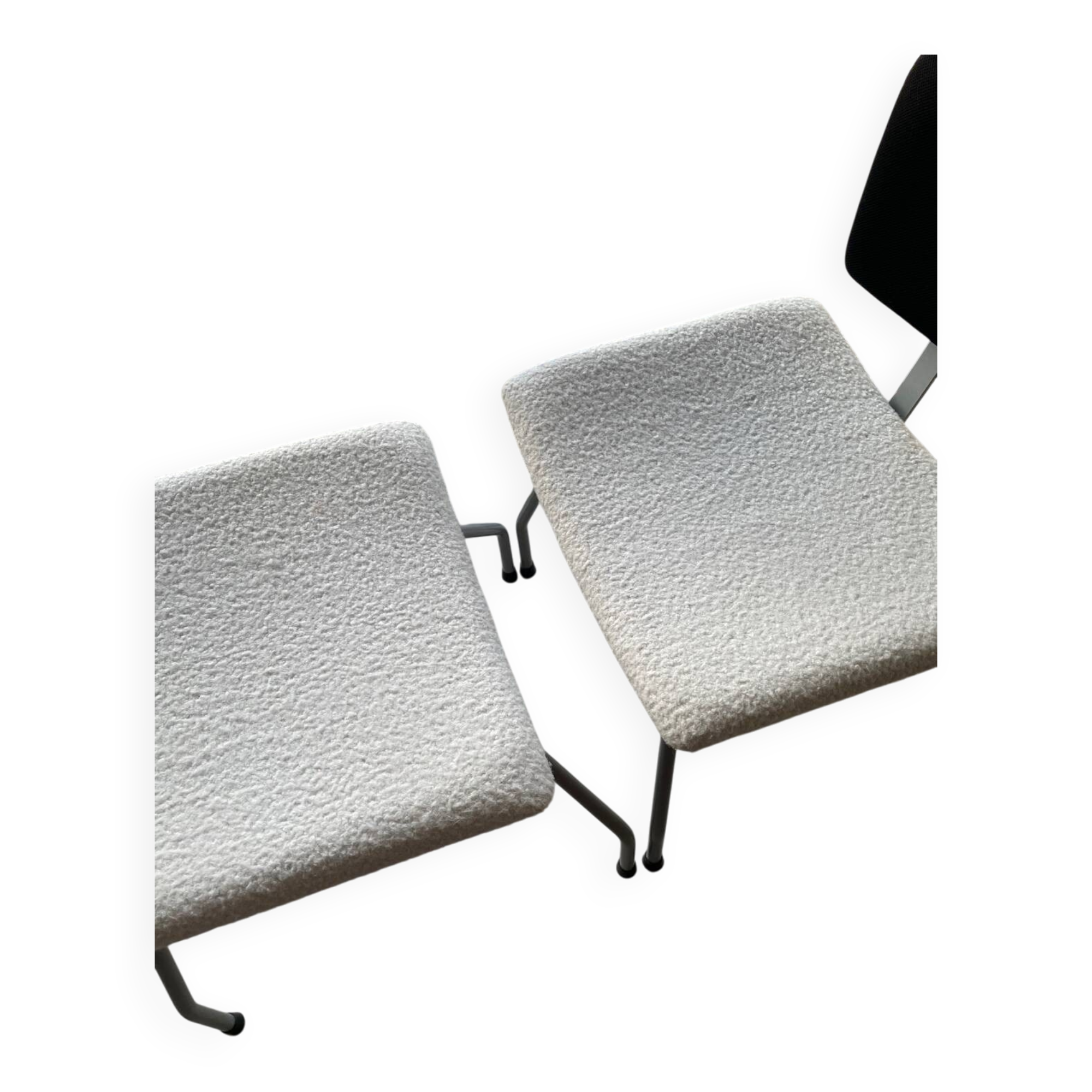 Armchair and footrest in boucle wool.