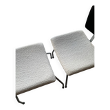 Armchair and footrest in boucle wool.