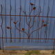 Barrière de jardin avec des oiseaux