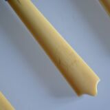 11 antique dessert knives from the 19th century with ivory-colored handles and a monogram