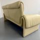 Two-seater designer sofa De Sede DS-2011 in cream leather with adjustable backrest.