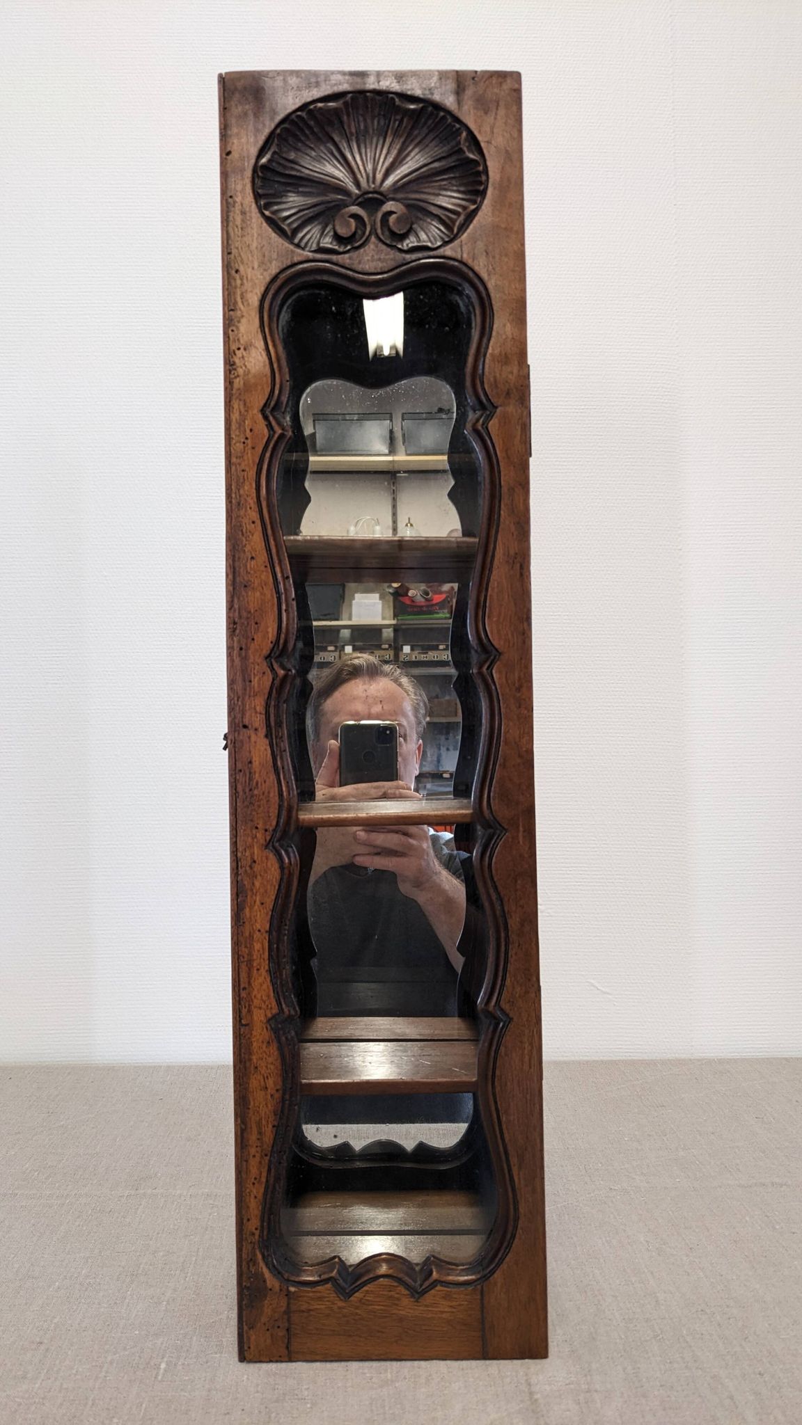 Louis XV style wall display cabinet in walnut, France mid-20th century.