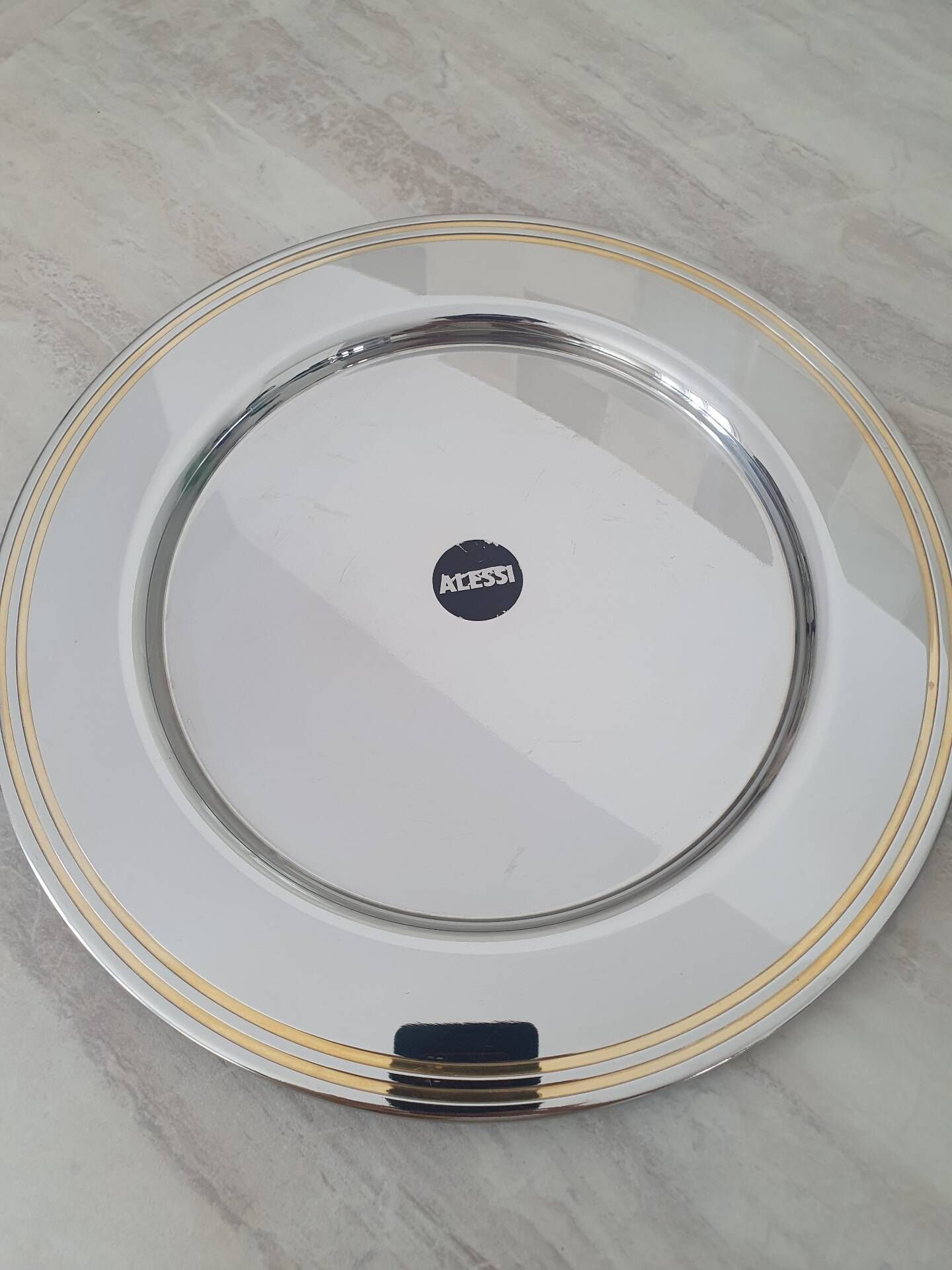 Alessi Ettore Sottsass / Serving plate stainless steel 18/10 and gold NG5100
