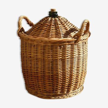 Demijohn covered with wicker