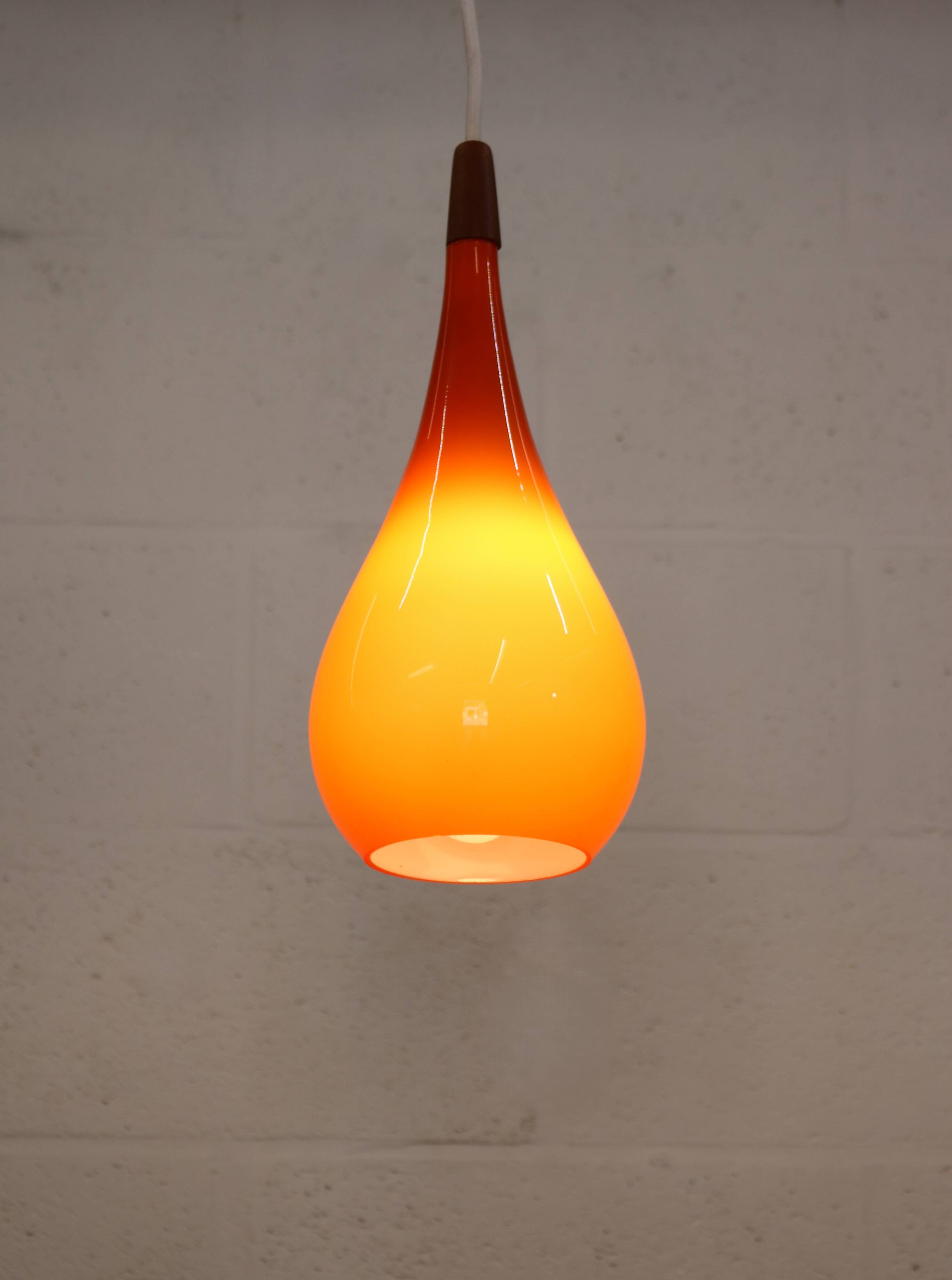 Orange teardrop glass pendant lamp made by Holmegaard - Denmark 1960