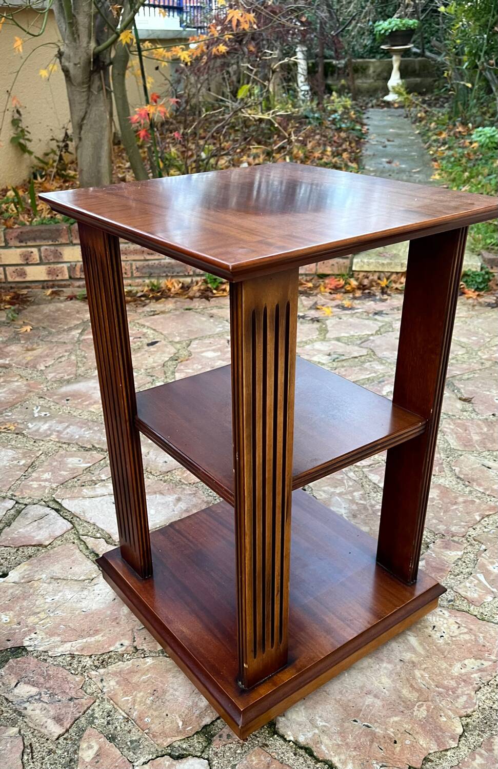 Vintage wooden shelf on caster legs