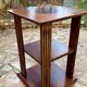 Vintage wooden shelf on caster legs