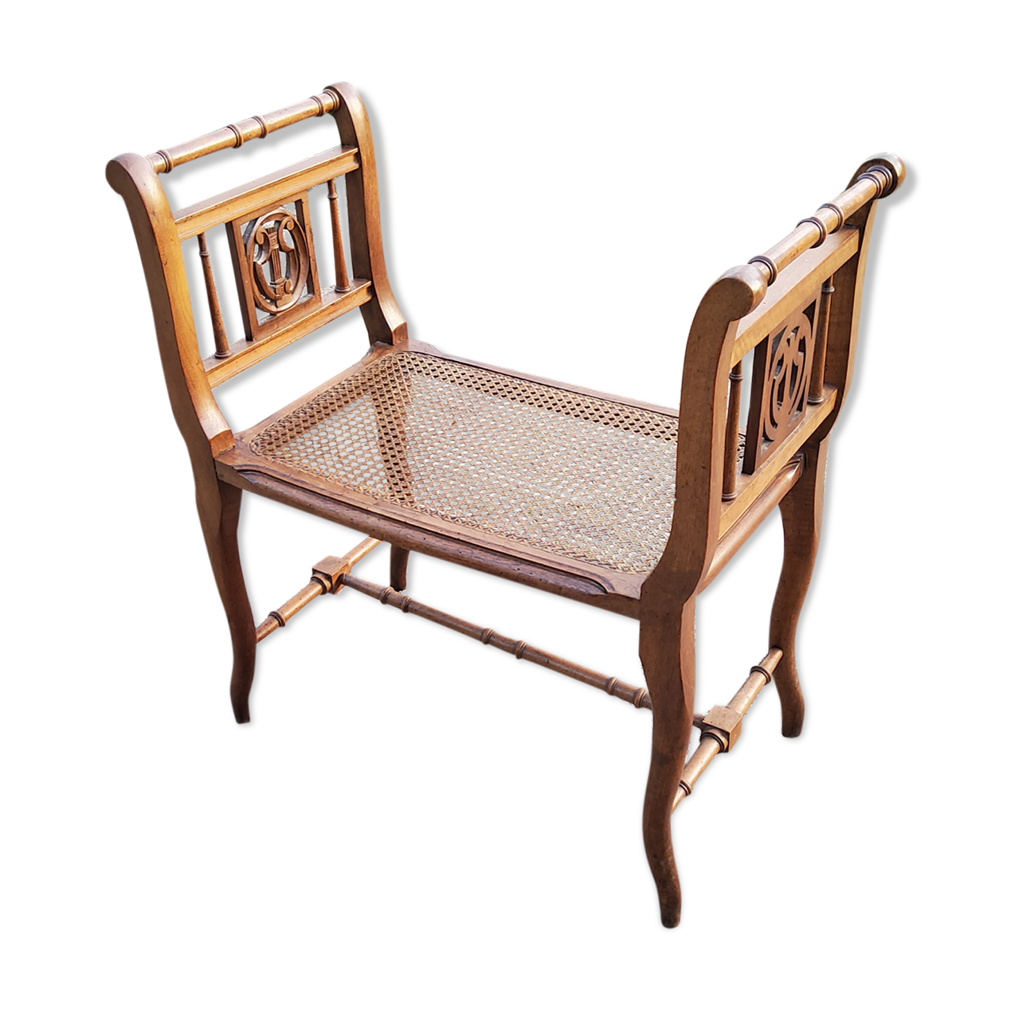 Former walnut cane music bench