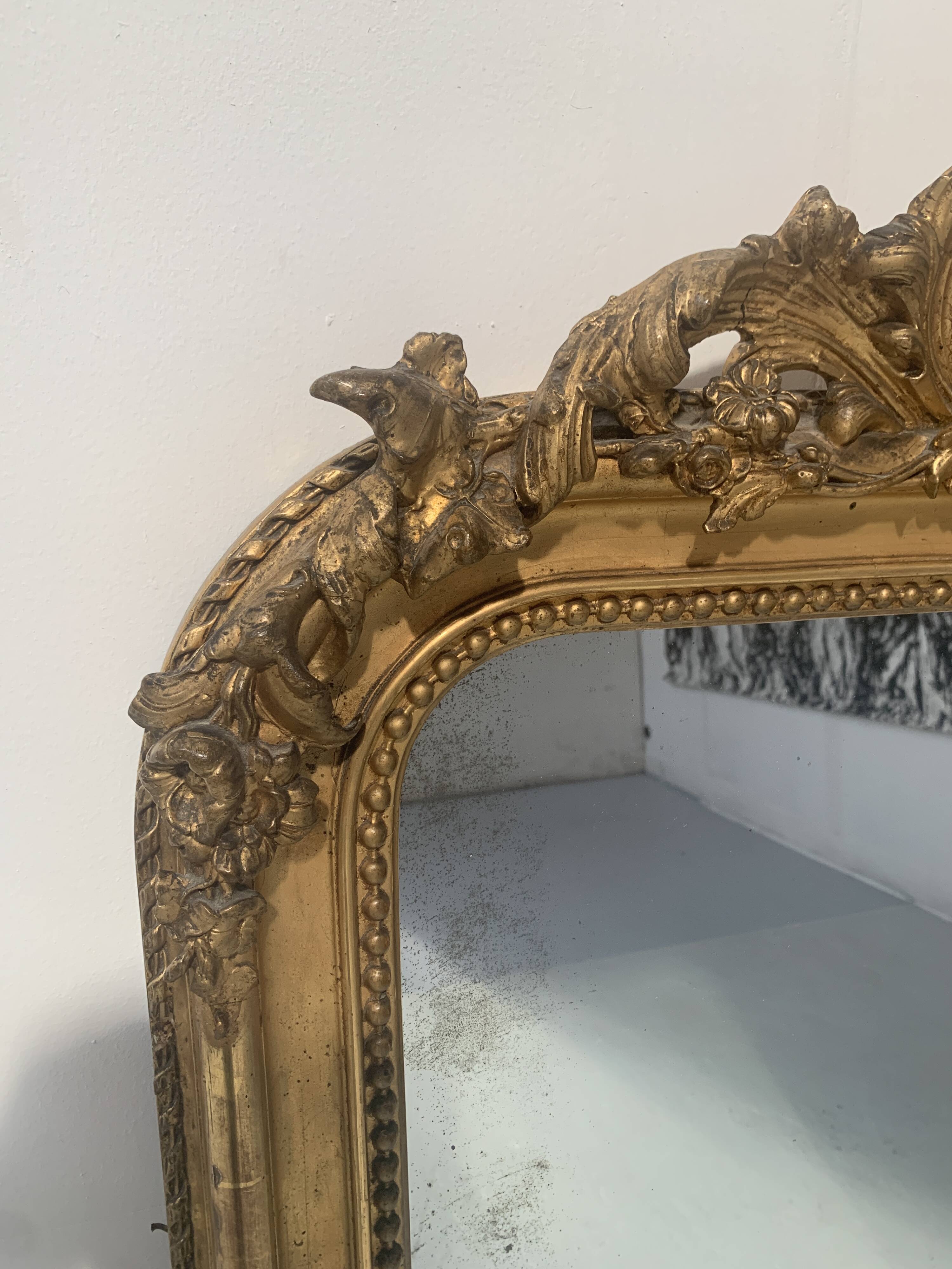 Louis XV style mirror in wood and gilded stucco, 19th century