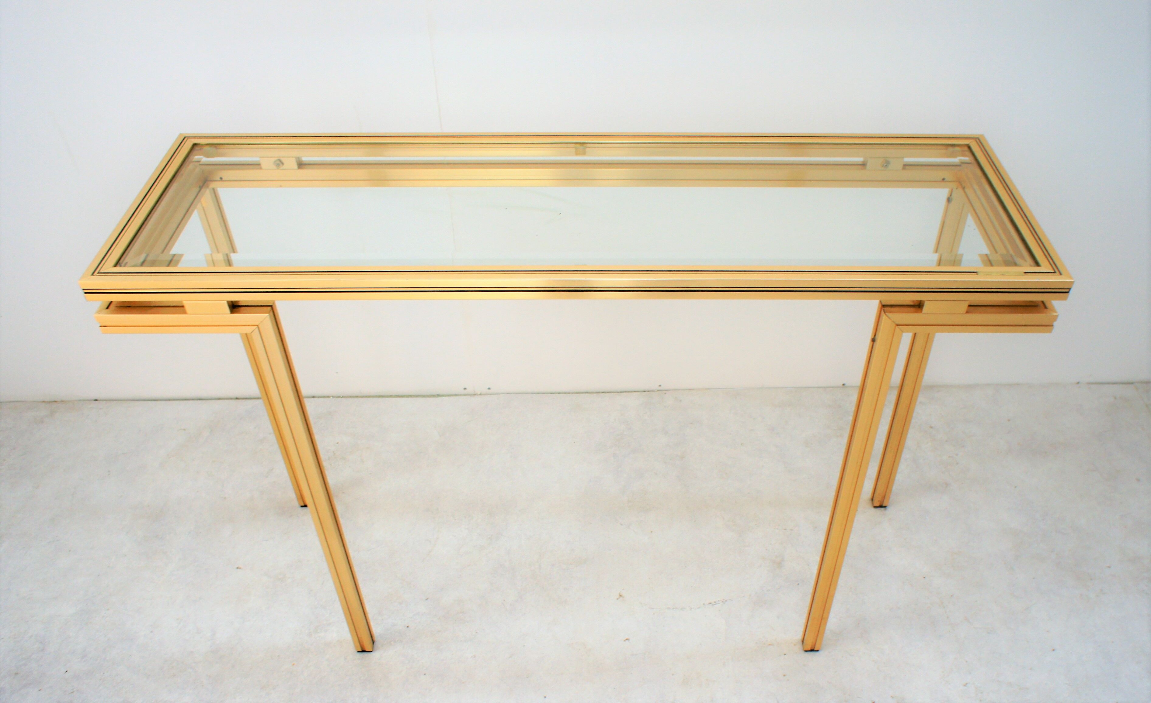 Gold metal console, Pierre Vandel