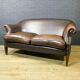 Vintage leather 2-seater sofa in dark brown