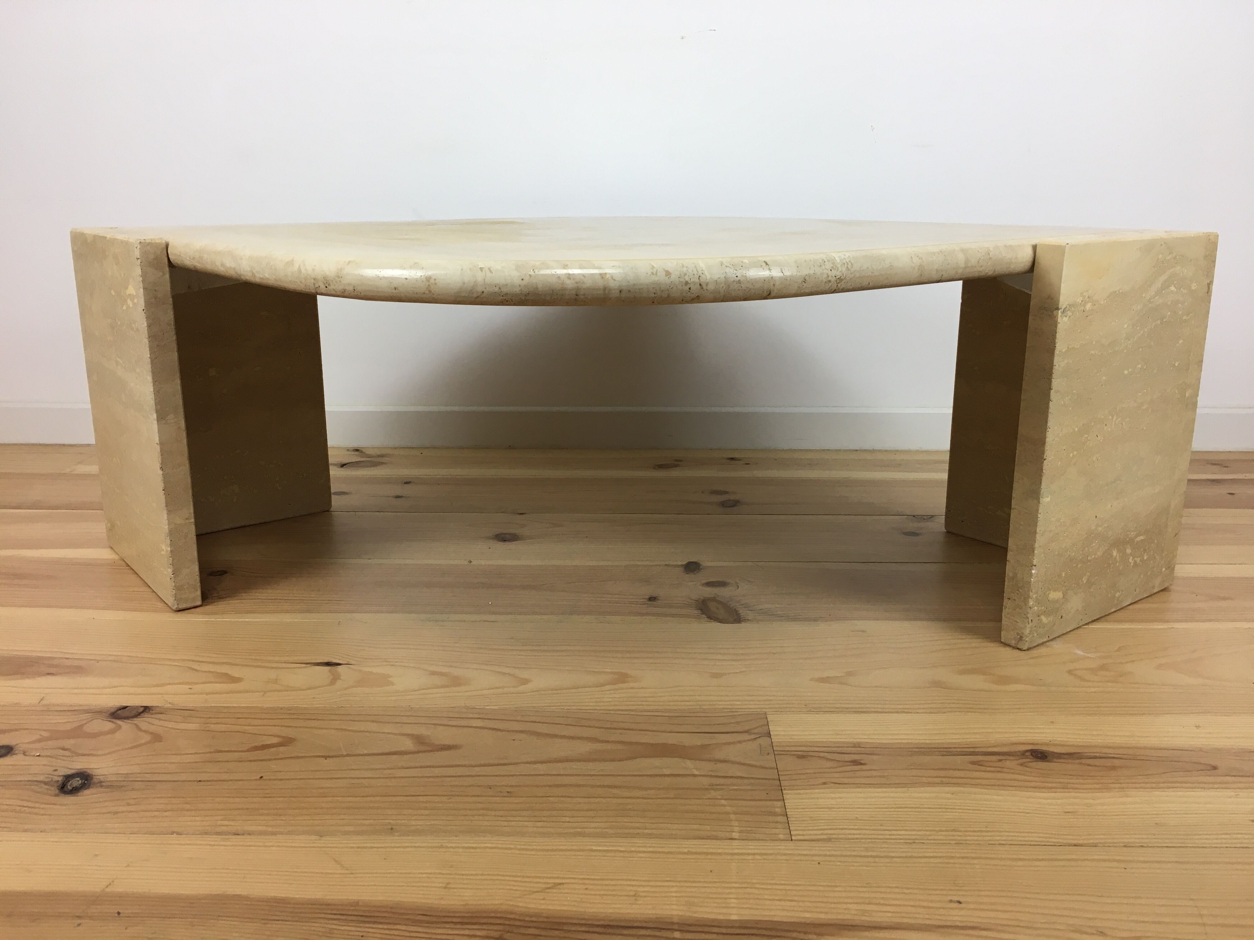 Bass table in travertine Roche Bobois