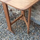 Old wooden table with double swings