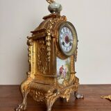 Napoleon III clock in gilded bronze and porcelain plates decorated and painted by hand