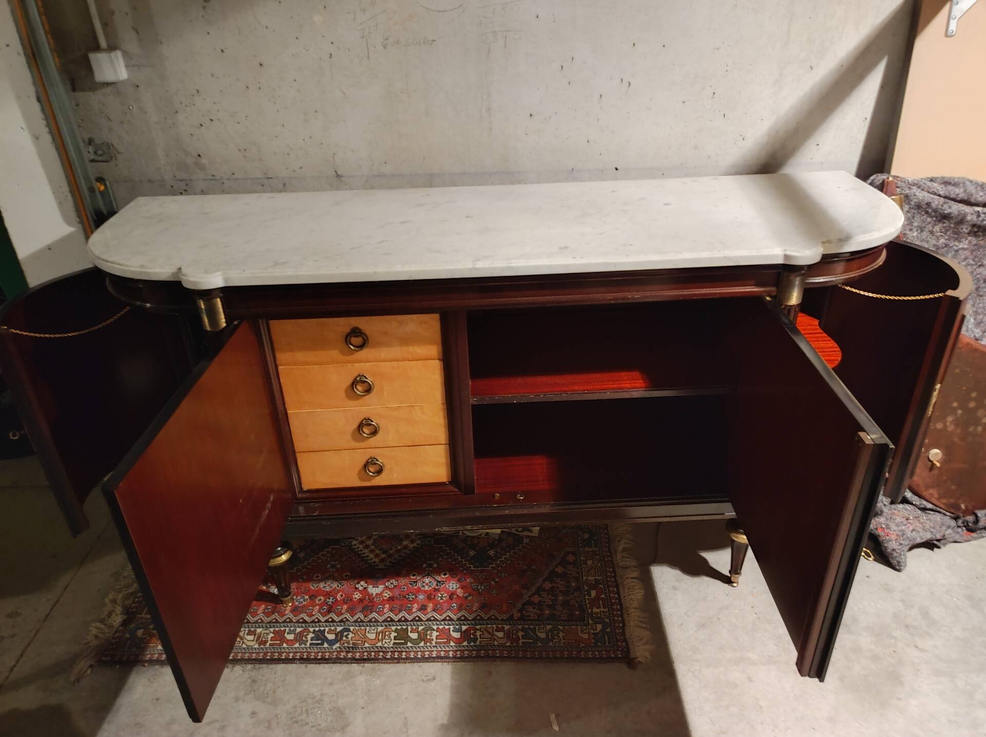 Sideboard in Louis XVI style with a marble top.