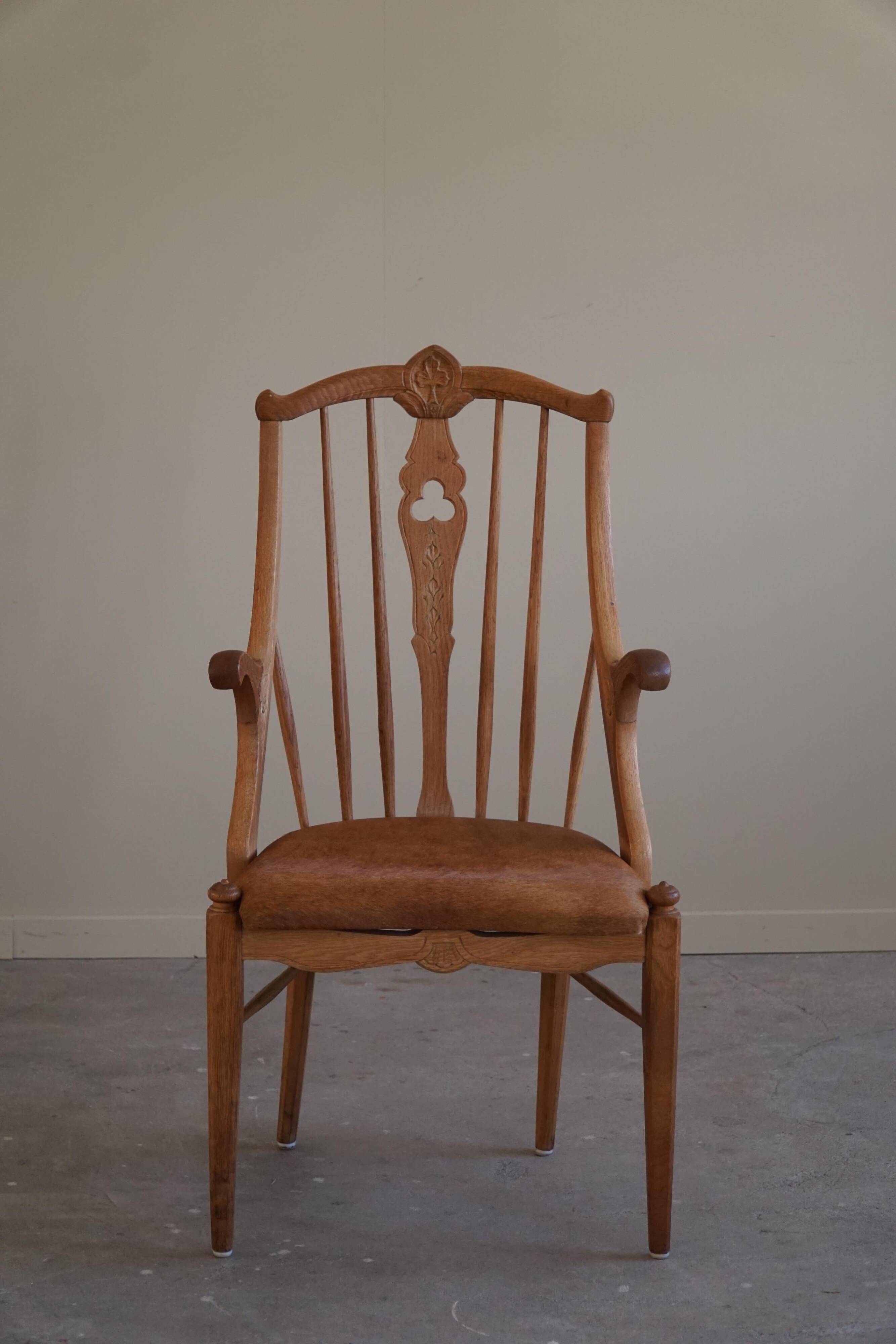 Danish high-back armchair in solid oak with leather cushion, mid-century, 1950s.