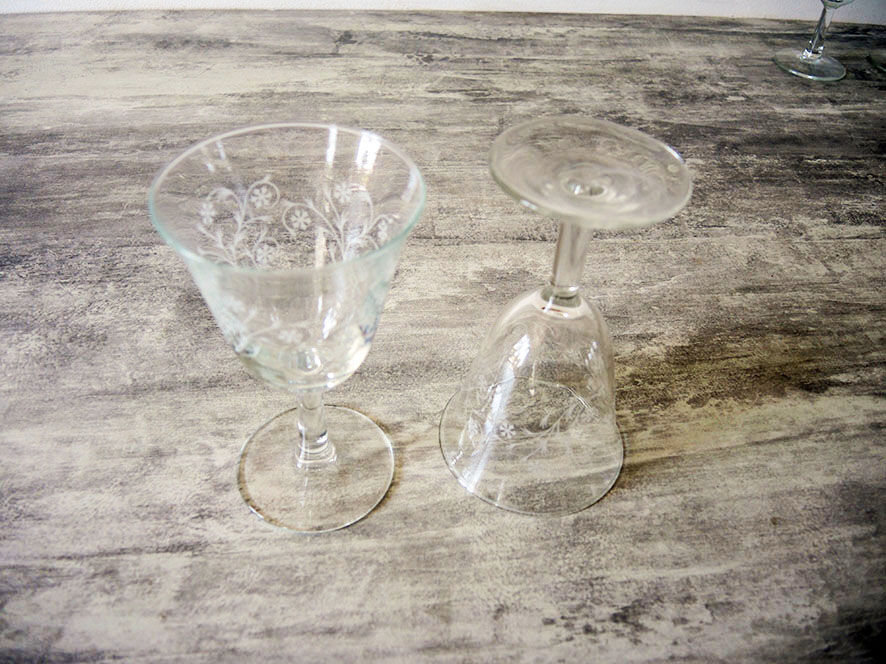 5 old transparent foot glasses – white floral pattern