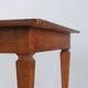Antique Directoire table in walnut and cherry, Italy, 19th century.