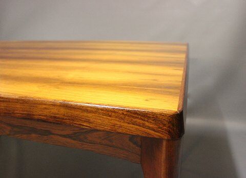 Teak dining table designed by Henning Kjaernulf and manufactured 60 years