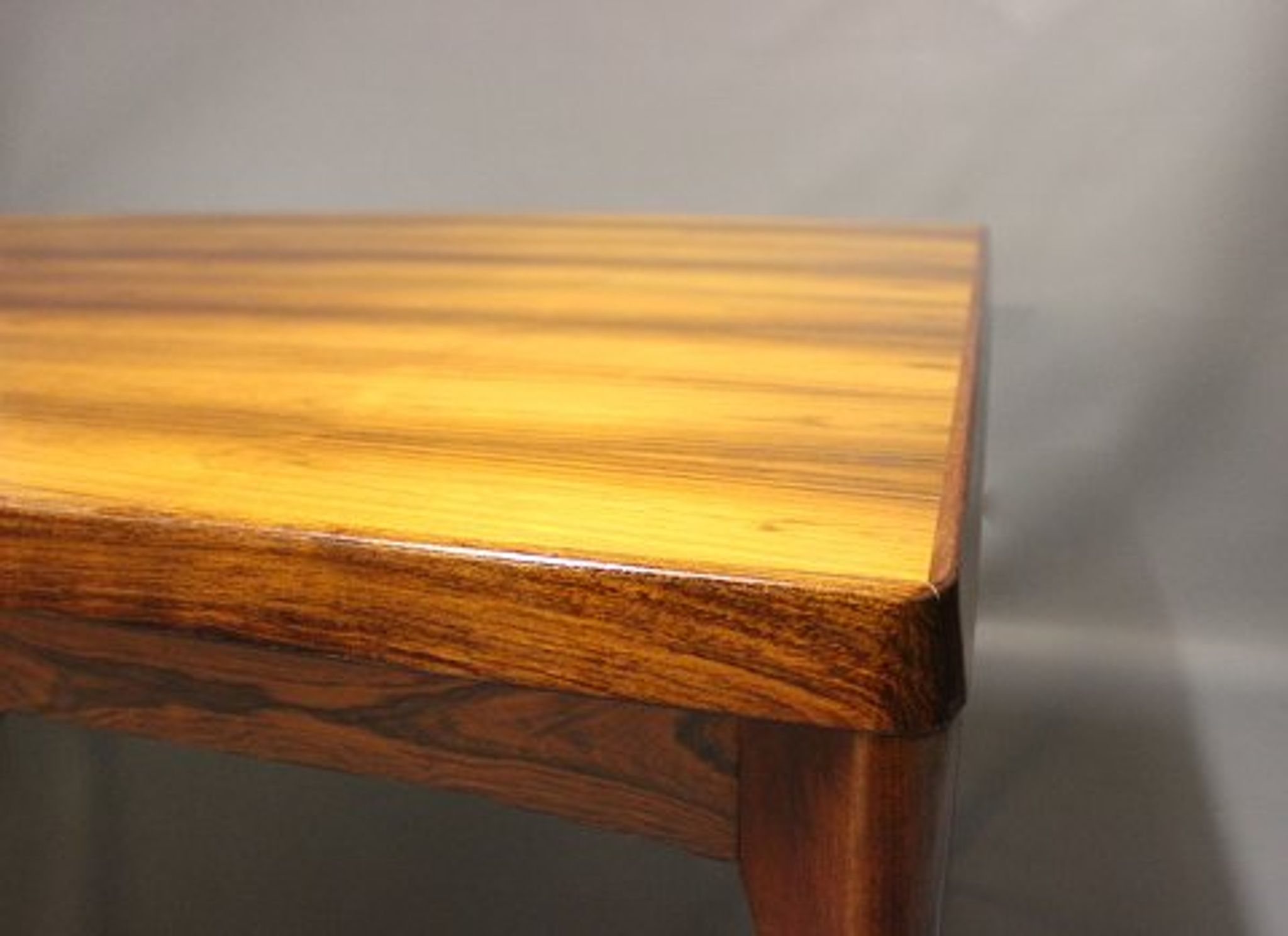 Teak dining table designed by Henning Kjaernulf and manufactured 60 years