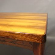 Teak dining table designed by Henning Kjaernulf and manufactured 60 years