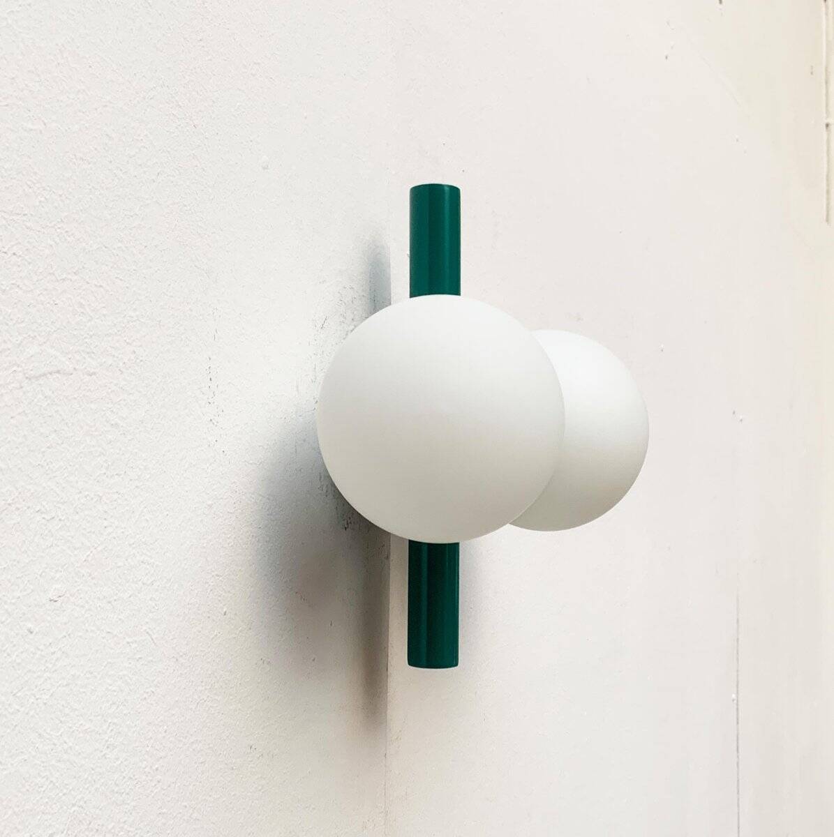 Mid-century German space age wall lamp by Kaiser Idell / Kaiser Leuchten.