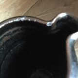 Ceramic pitcher. Belly shape. Motives on both sides